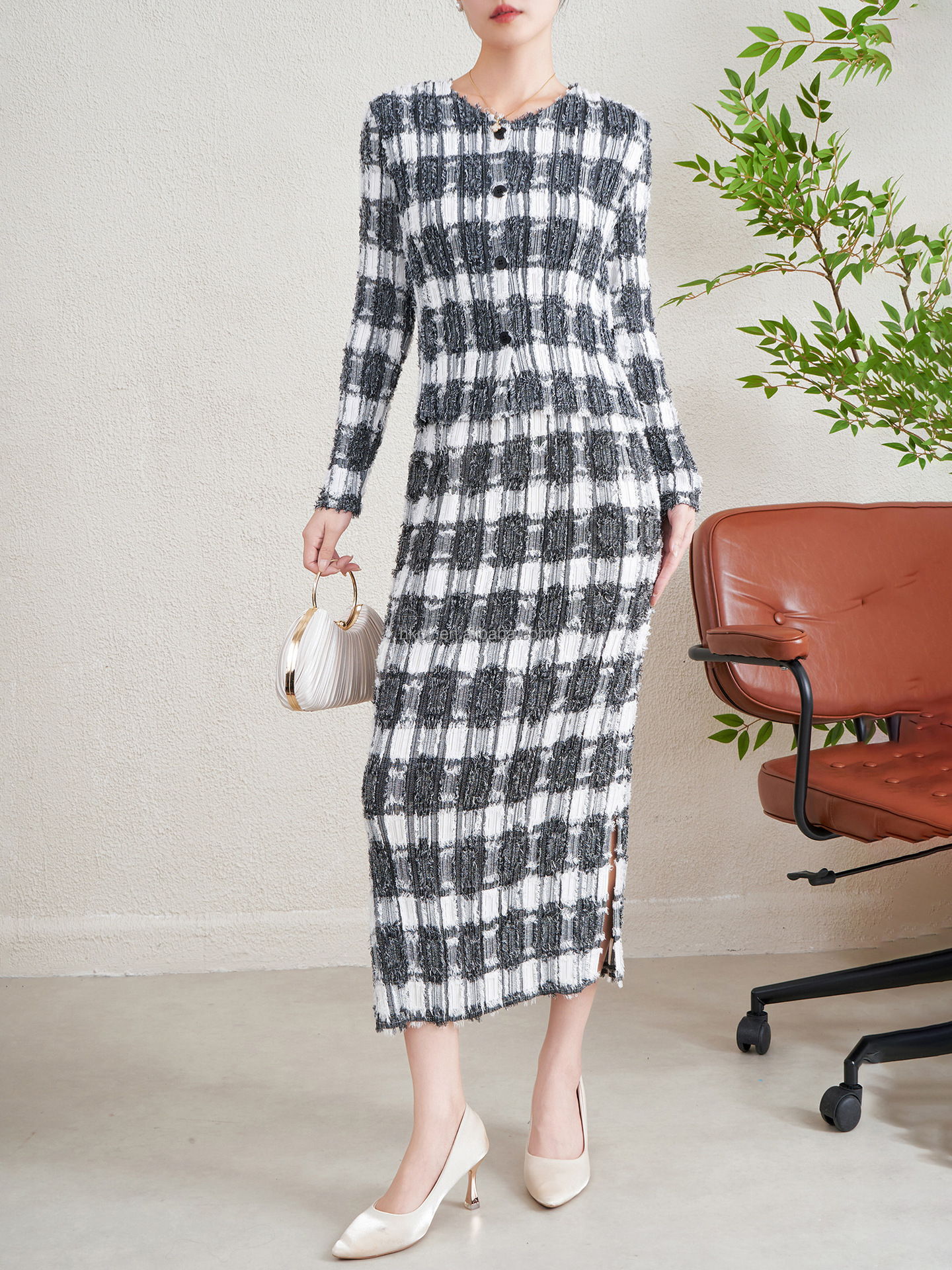 Model wearing pleated suit style 3