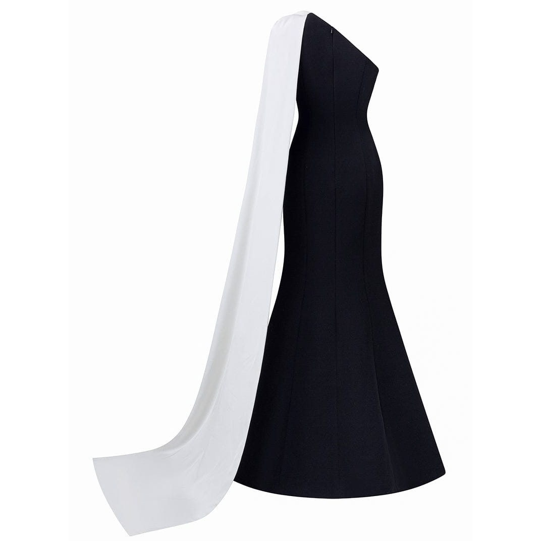 The Monochrome Rose Architectural Gown This striking floor length gown in avant garde tailoring and modern minimalism