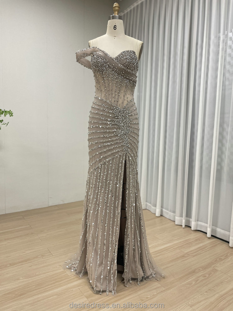 MB40396B Glamorous Sheer Gown with Crystal Beaded Details Sexy High Slit Dresses Perfect for Party Prom Formal Red Carpet Events