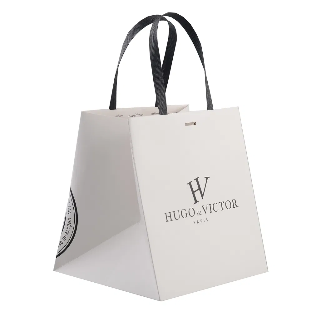 Bolsas de compras blancas reutilizables y ecológicas al por mayor, embalaje de papel de lujo personalizado con impresión de logo para joyería, ropa y regalos