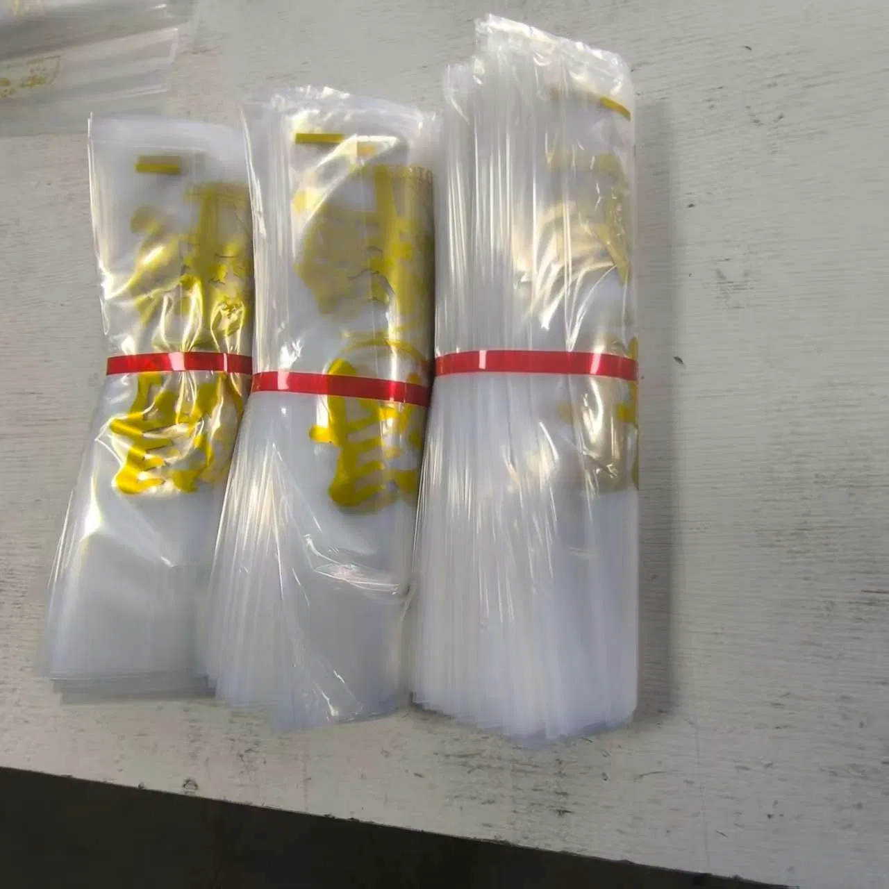 Bolsa de embalaje de plástico personalizada a granel, impermeable y ecológica para prendas de vestir