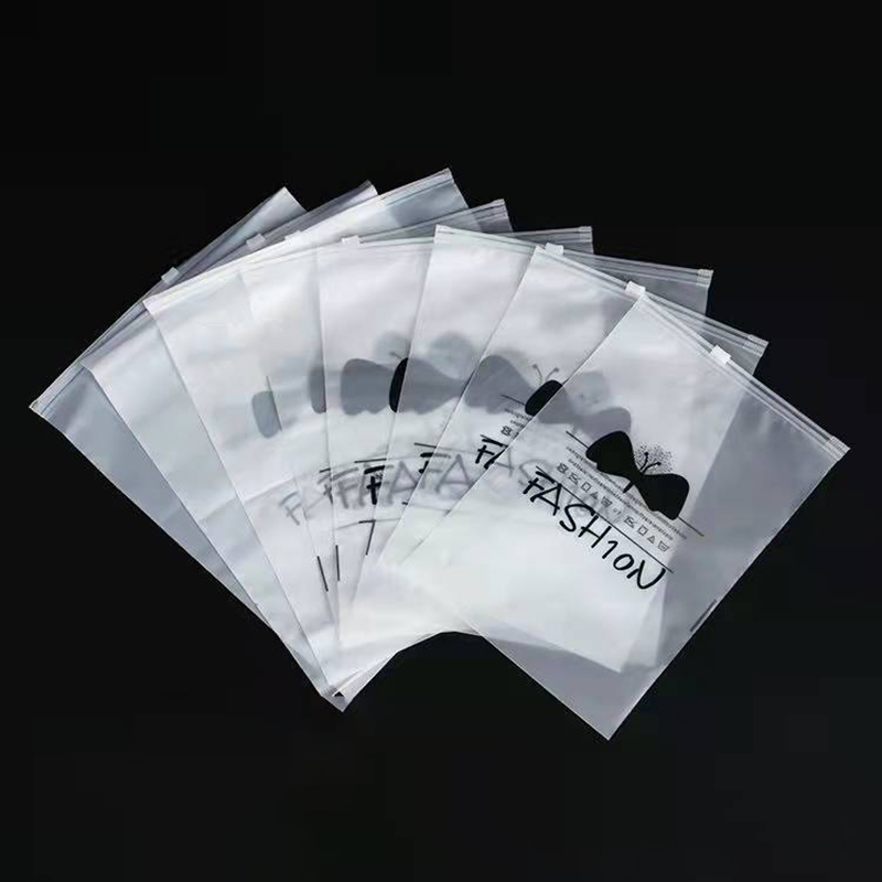 Bolsa de ropa de plástico PVC transparente con logo impreso personalizado, bolsa de camiseta con cremallera para empaquetar prendas