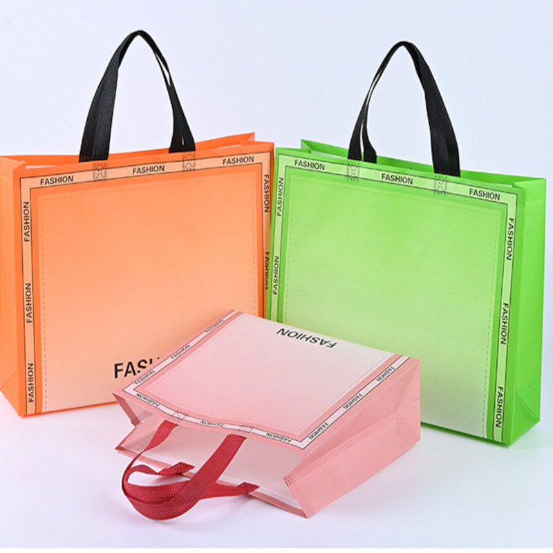 Bolsa de mano no tejida impresa "Moda" con asas, bolsa de compras reutilizable y moderna, bolsa de regalo ecológica y ligera para tienda de ropa, comercio minorista, supermercado