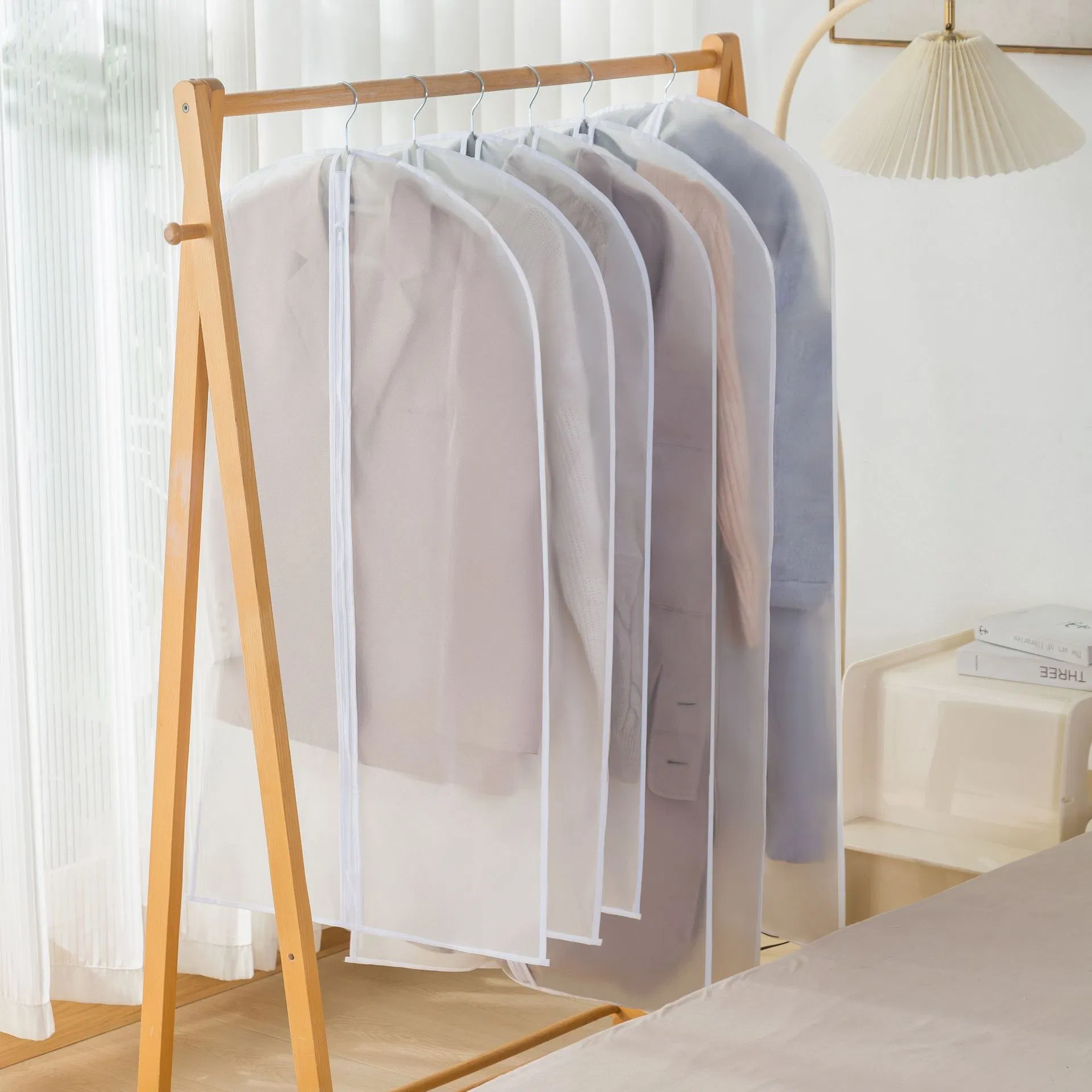 Funda de ropa transparente a prueba de agua con bolsillo colgante para almacenamiento de abrigos para uso doméstico