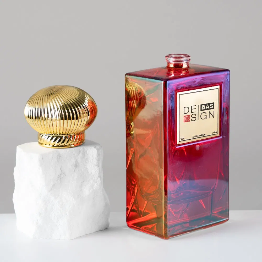 Factory Supply Luxury 50ml Red Iridescent Empty Glass Perfume Bottle with Gold Ribbed Cap for High End Cosmetic Branding