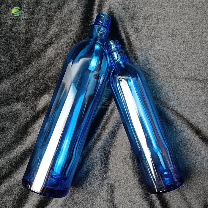 High Quality Custom Logo Round Shape 750ml Whisky Glass Bottles Liquor Bottle with Lids