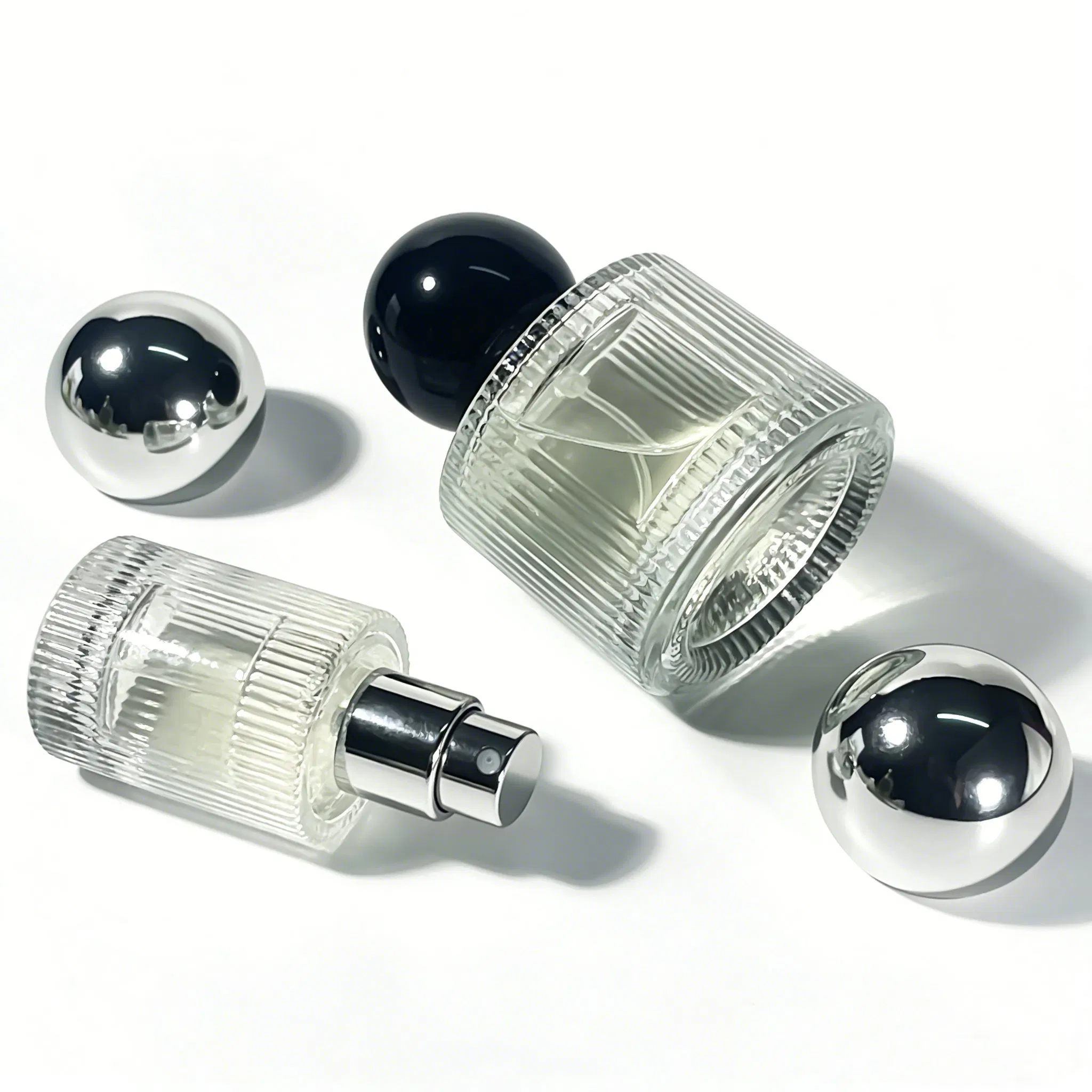 Customizable Label 50ml Vertical Stripe Transparent Glass Perfume Spray Bottle Embossed Bottle with Crimp Spray