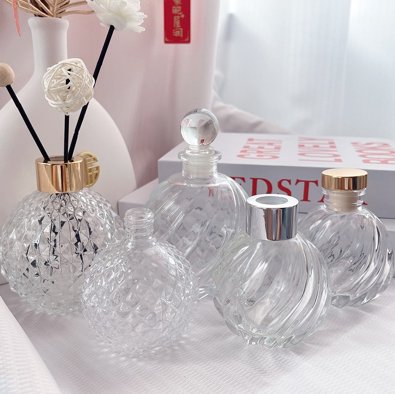 Wholesale 100ml Transparent Spherical Embossed Car Aroma Diffuser Home Decoration Crystal Glass Bottle