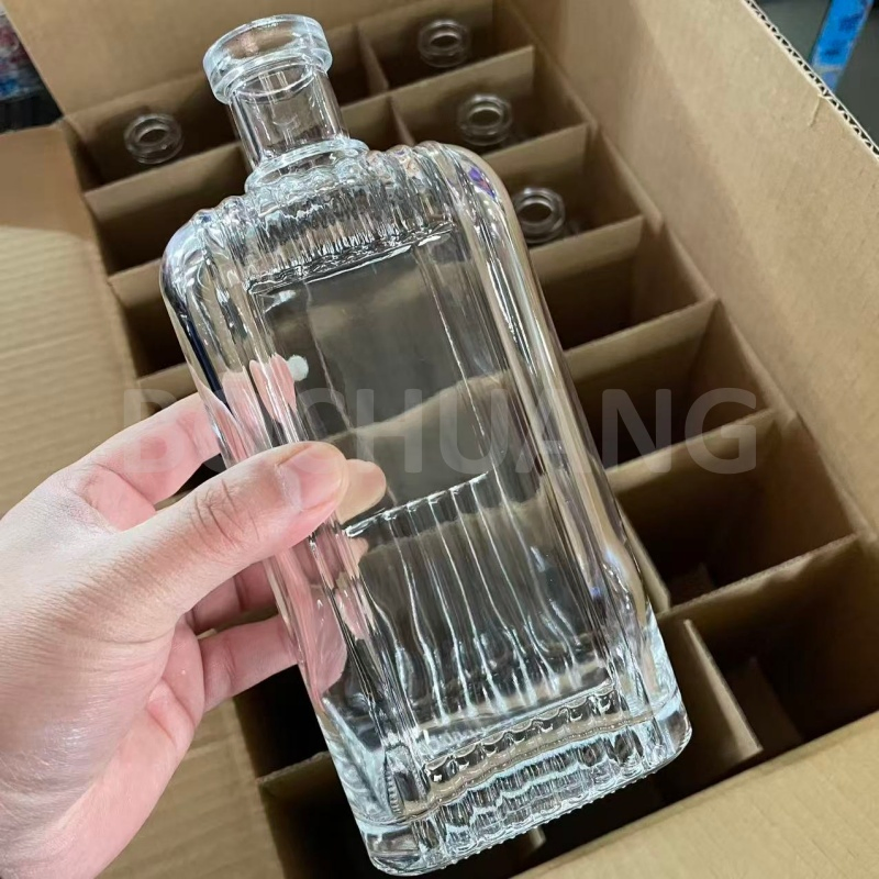 Custom Embossed 500ml 700ml 750ml Clear Square Glass Alcohol Bottle for Spirit Whiskey Vodka Gin Tequila Mezcal Rum Brandy
