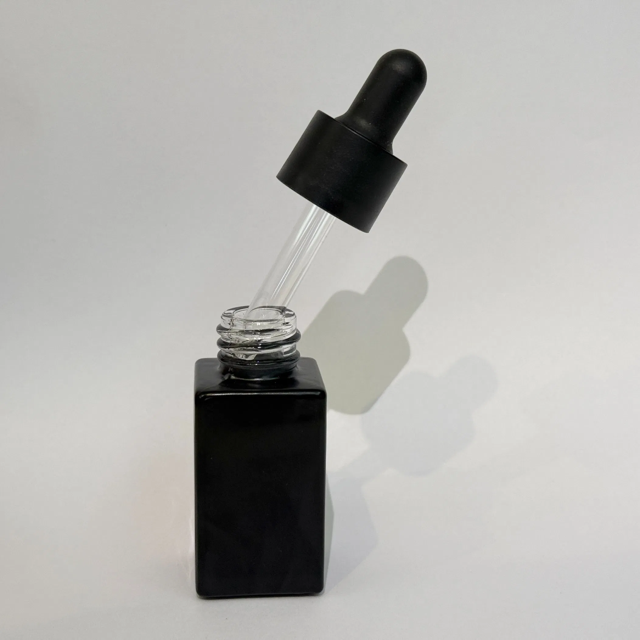 Personalized Logo Printed 15ml 30ml 50ml Bottle Packaging Square Cube Glass Bottle Smoking Bottle Essential Oil Dropper Bottles