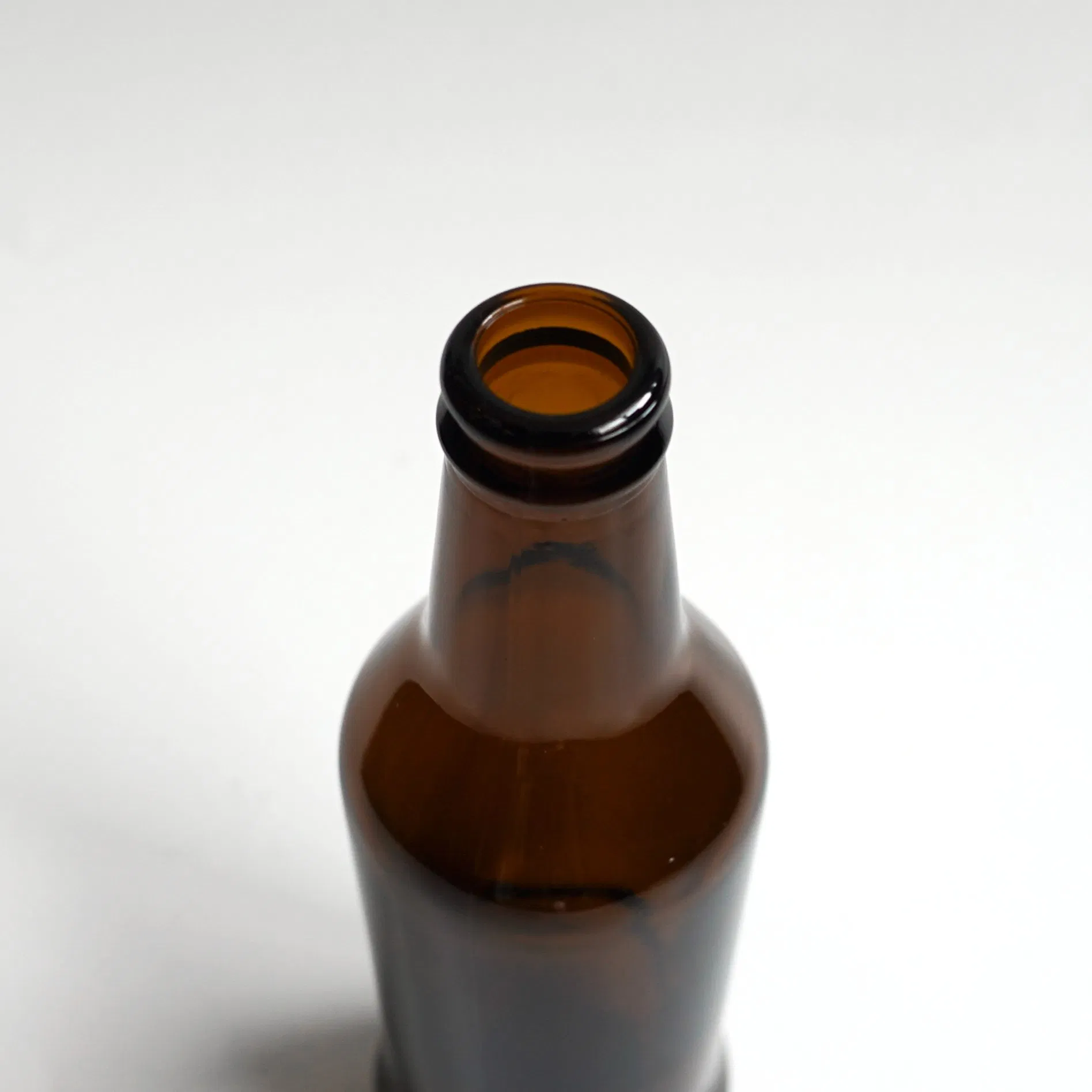 Transparent Beer 250ml Beer Bottle with Crown Cap Nnpb Technology Lightweight Bottle
