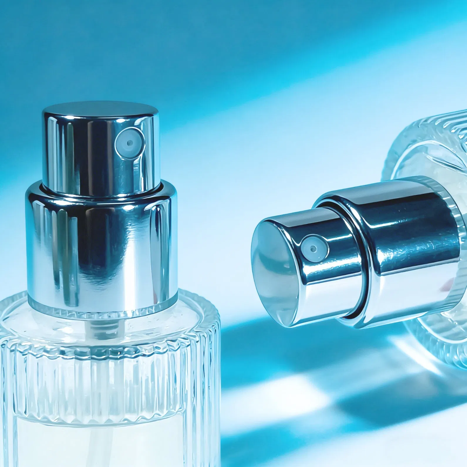 Customizable Label 50ml Vertical Stripe Transparent Glass Perfume Spray Bottle Embossed Bottle with Crimp Spray