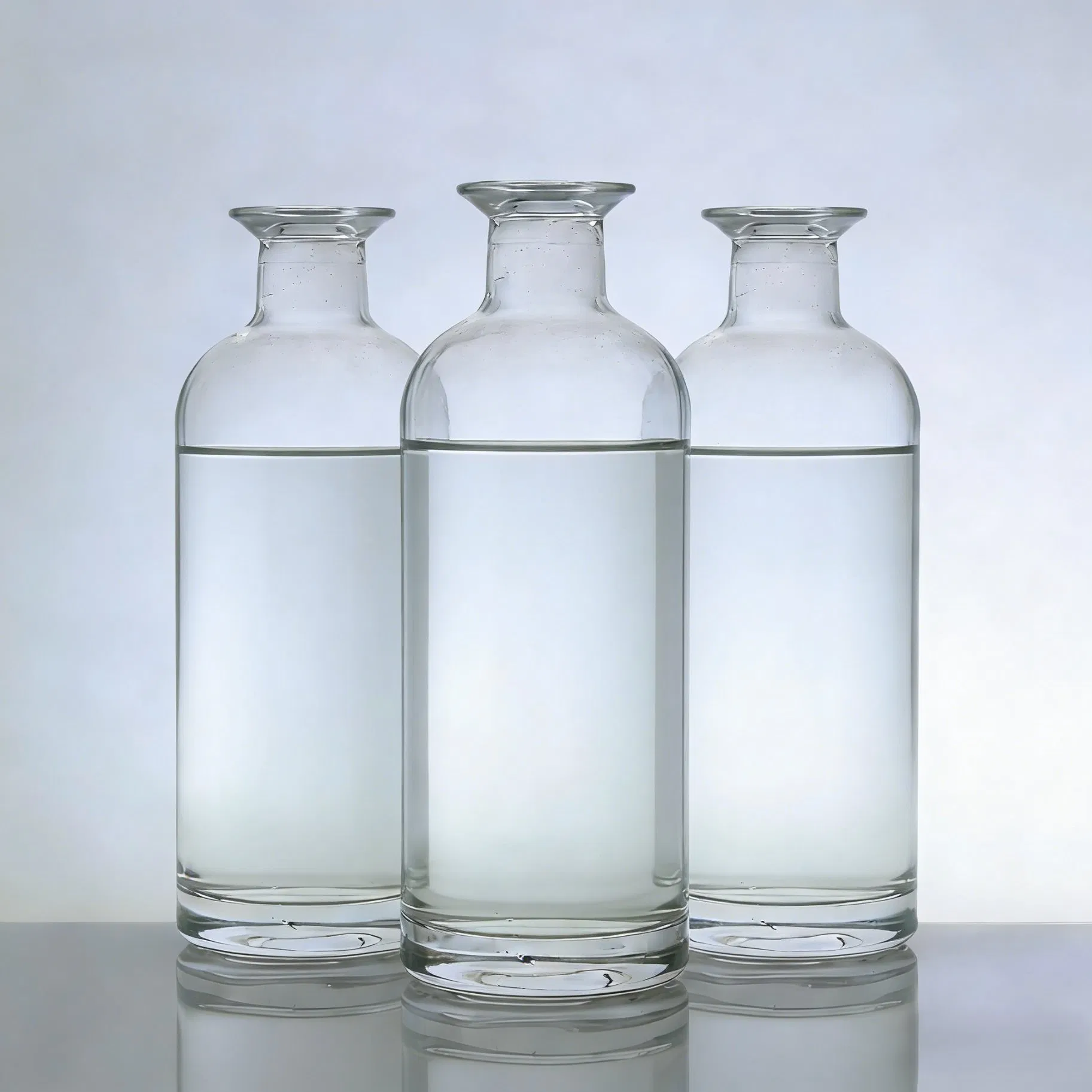 750ml 700ml Glass Round Liquor Bottles for Vodka Gin Whiskey Tequila Rum Mezcal with Cork Finish