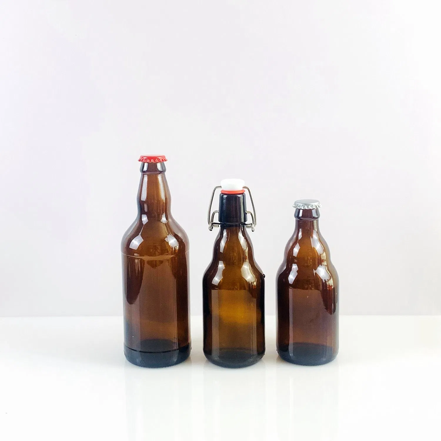 Hot Stamping Beverage for Beer Short Neck 330ml Manufacturer Amber Beer Glass Bottle with Crown Cap