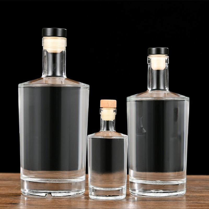 Wholesale Neos 375ml 500ml 700ml Round Clear High Flint Whiskey Vodka Glass Liquor Bottle with Screw Cork Finish