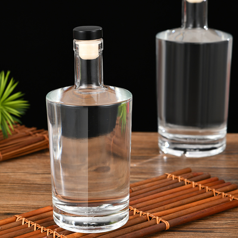 Wholesale Neos 375ml 500ml 700ml Round Clear High Flint Whiskey Vodka Glass Liquor Bottle with Screw Cork Finish