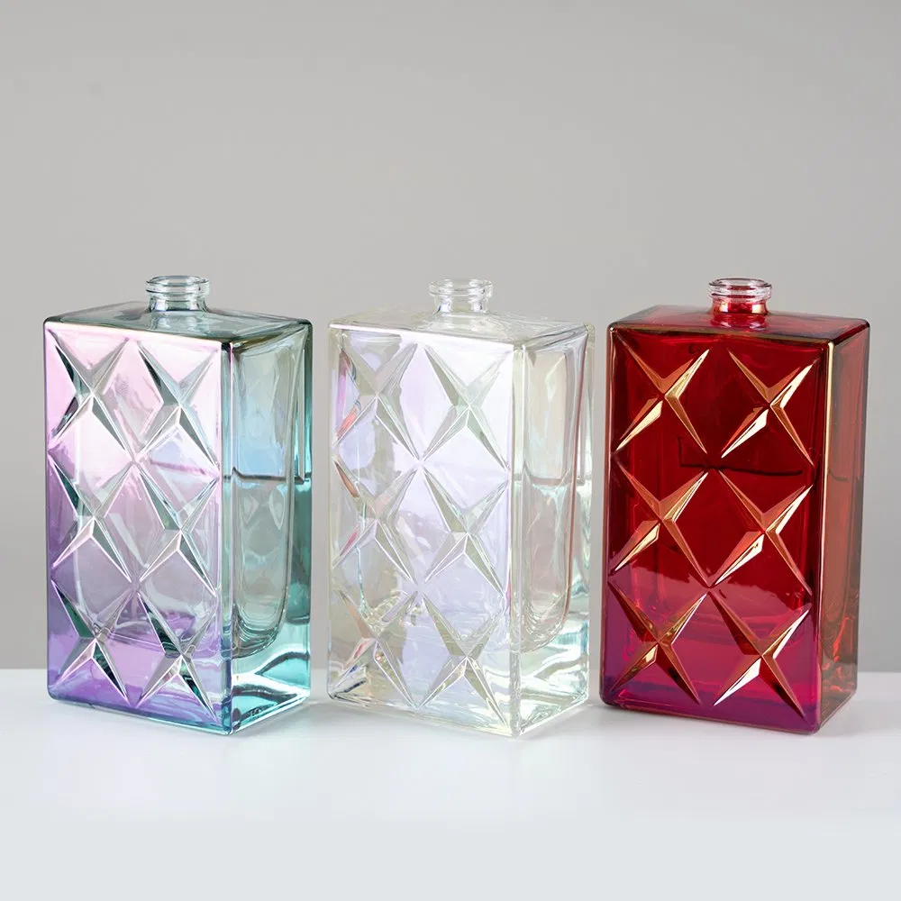 Factory Supply Luxury 50ml Red Iridescent Empty Glass Perfume Bottle with Gold Ribbed Cap for High End Cosmetic Branding