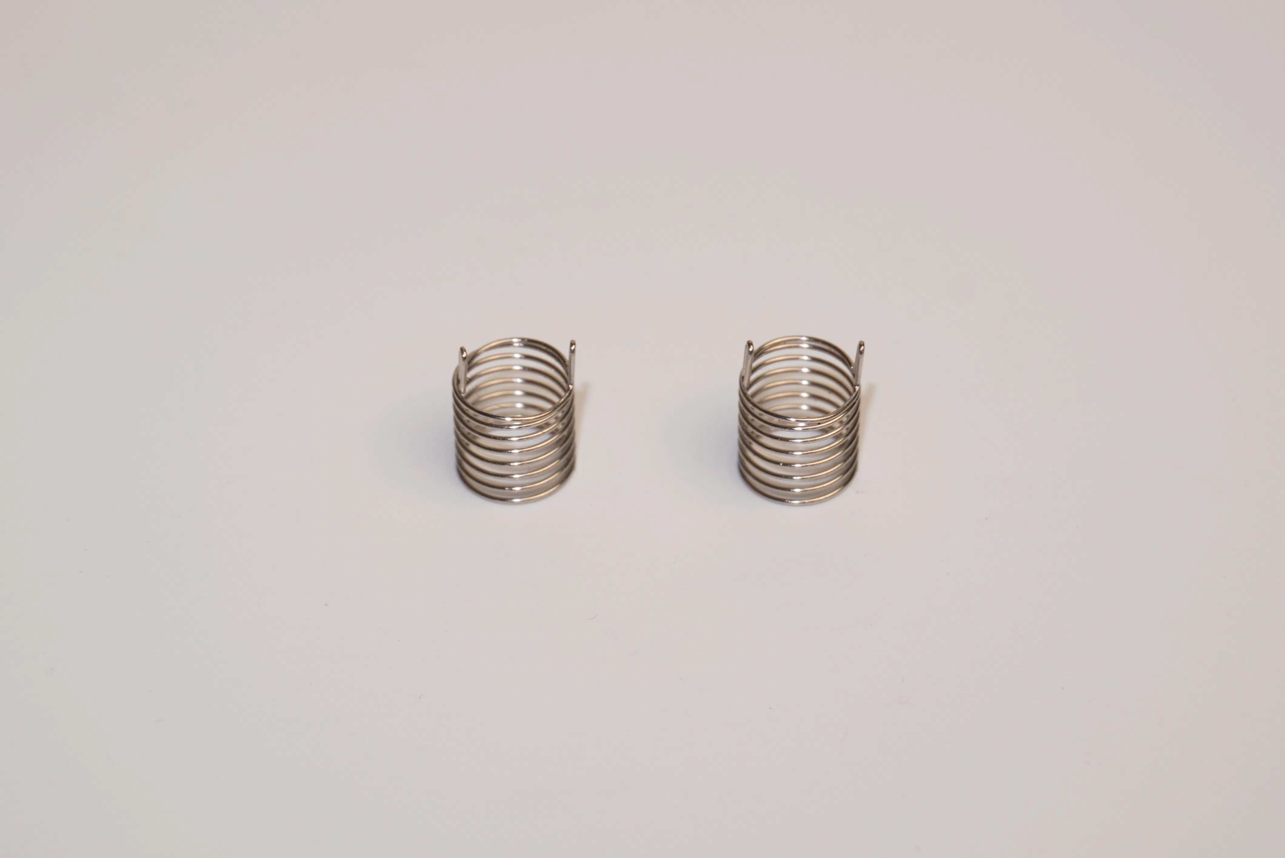 Elliptical-Machine Spring for Smooth Resistance and Workout Consistency