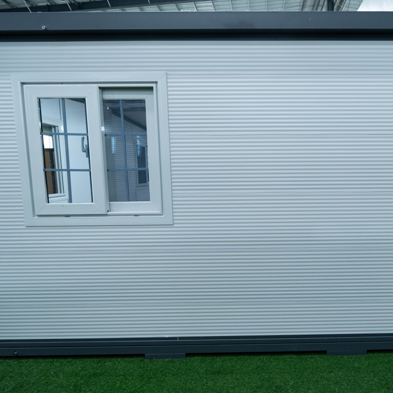 Custom F700 Expandable Container House White Exterior Prefab Cabin with Left‑Side Glass Entry Door Suppliers, Factories