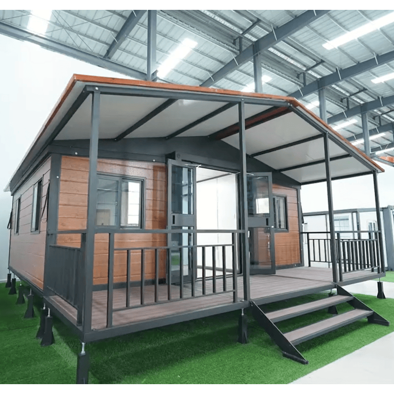 Double-wing expandable container house with terrace