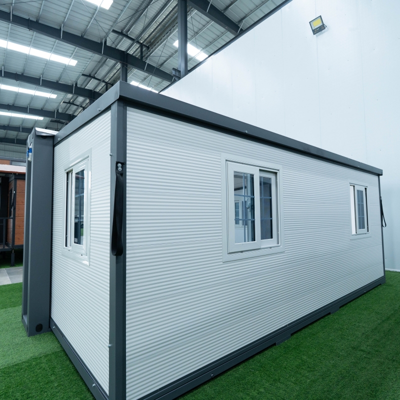 Custom F700 Expandable Container House White Exterior Prefab Cabin with Left‑Side Glass Entry Door Suppliers, Factories