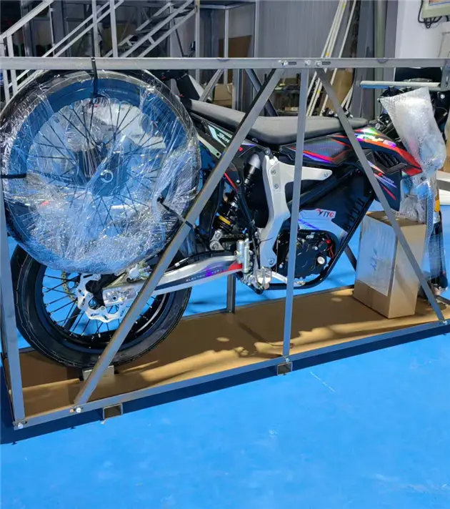 Packaging electric motorcycles for global export at Capriole factory