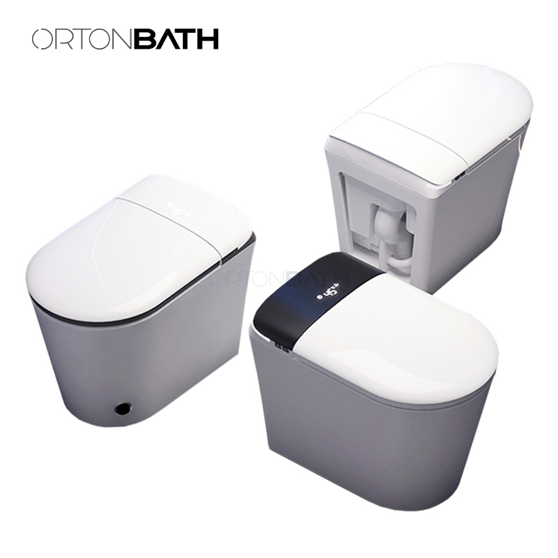 Ortonbath One Piece Floor Mounted Smart Toilet Intelligent Wc Toilet Auto Flush Foot Sensor Modern Tankless Toilet Sanitary Ware with LED Display Seat