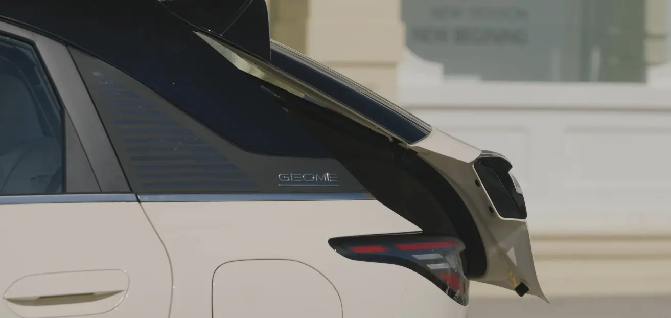 Dual-drive electric anti-pinch tailgate