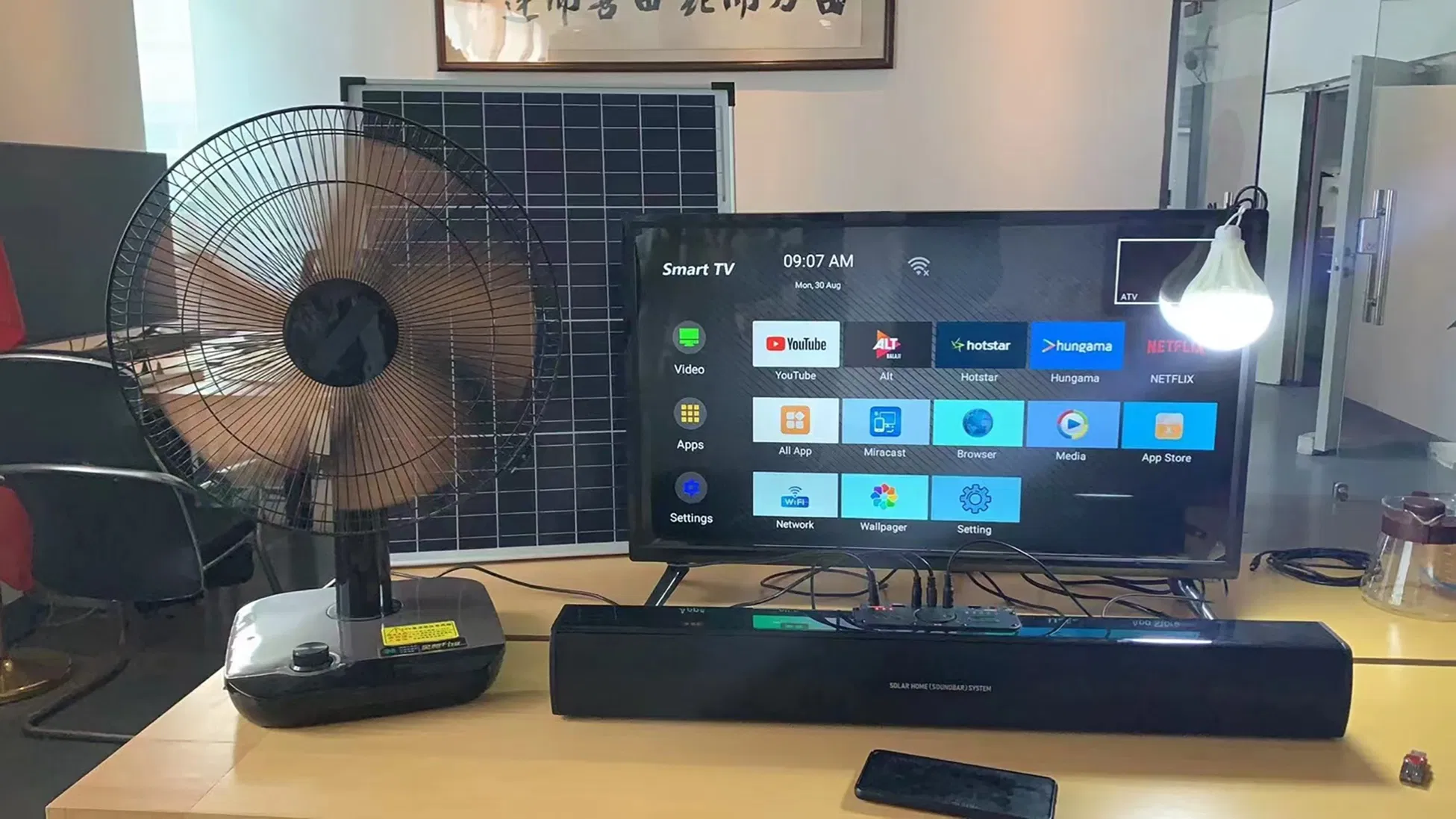 Sistema Solar Mini Power para Hogar con 32inch Televisor LED Luz Ventilador de Corriente Continua Panel Solar para Uso Rural o de Emergencia