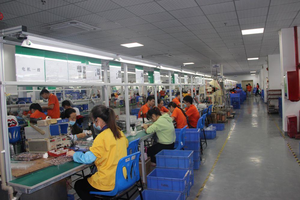 TOPARC production floor with assembly lines and workers