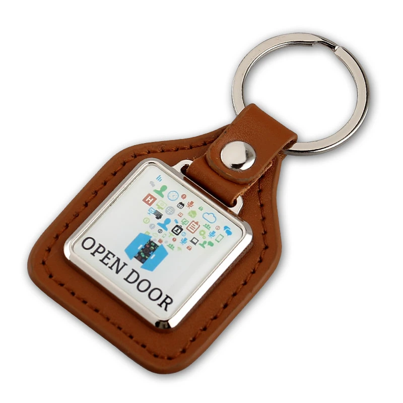 China Supplier Personalized Custom Metal Embossed Logo Genuine Leather Key Chain for Business Gift