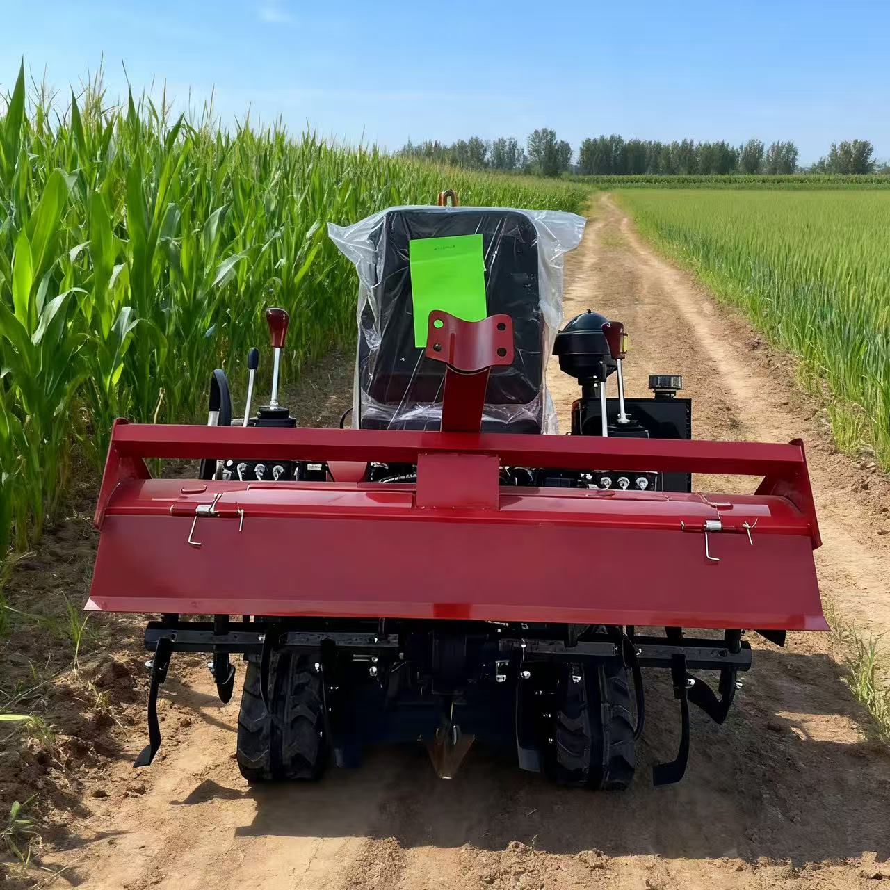 Agricultural Mini Crawler Tractor Ride-on Rotary Tiller Multifunctional Equipment for Plowing Land on Farm
