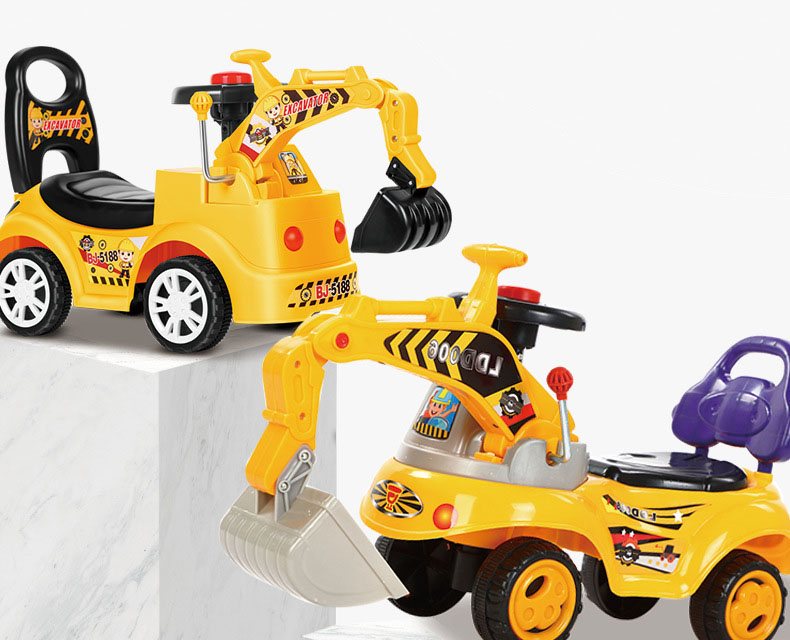 Kids sliding car ride on digger side view