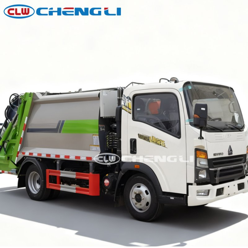 Professional Garbage Compactor 4X2 HOWO 5.8cbm Rear Garbage Truck with Push Plate Unloading