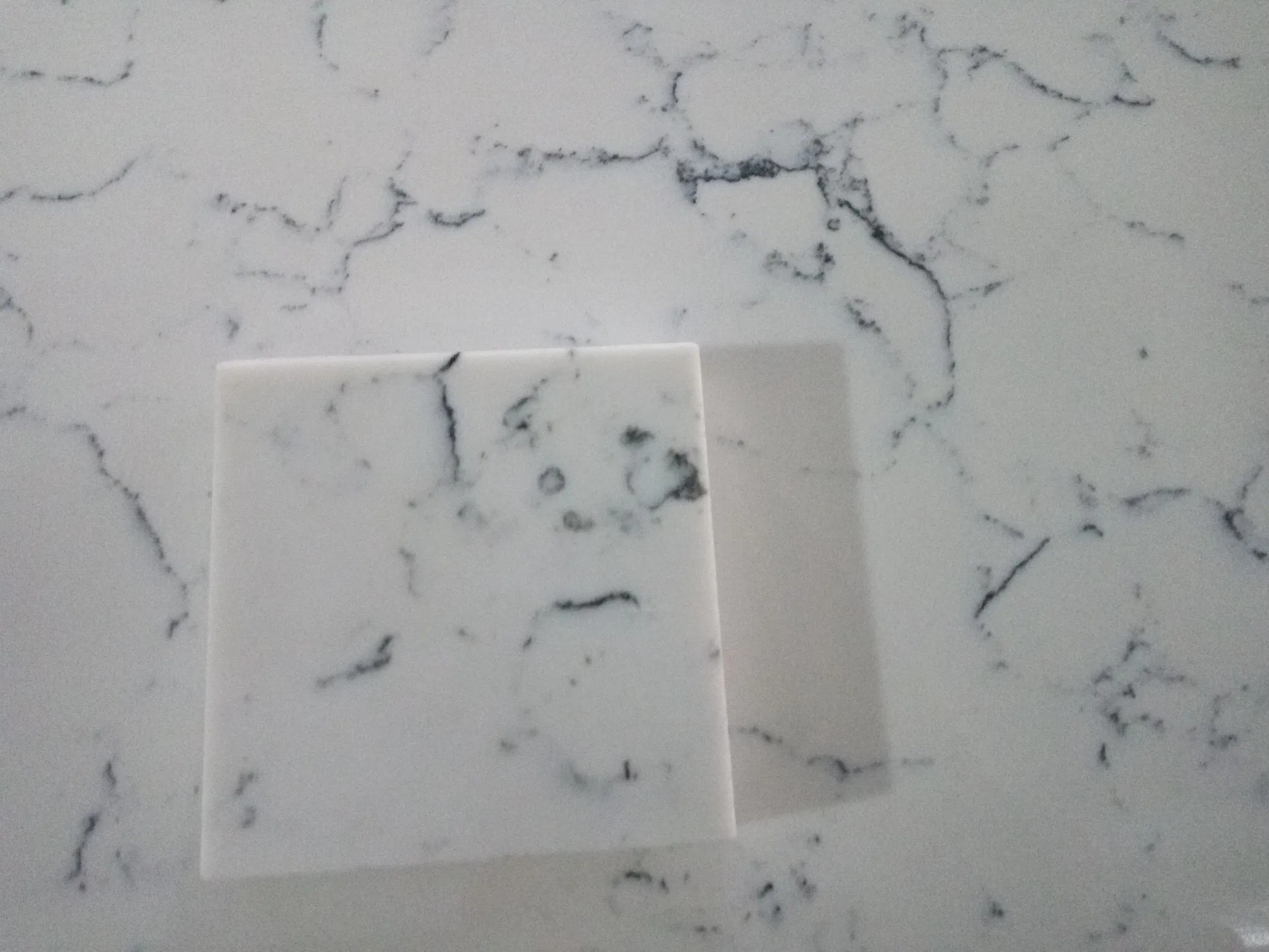 Carrara White Quartz Kitchen Countertops, Dining Tables, and Fireplaces - Custom Artificial Stone Slabs with Marble Aesthetic