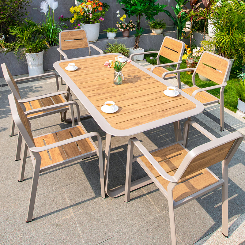 Hot Selling Plastic Wood Patio Furniture Set Waterproof Weather Resistant Outdoor Dining Table and Chair