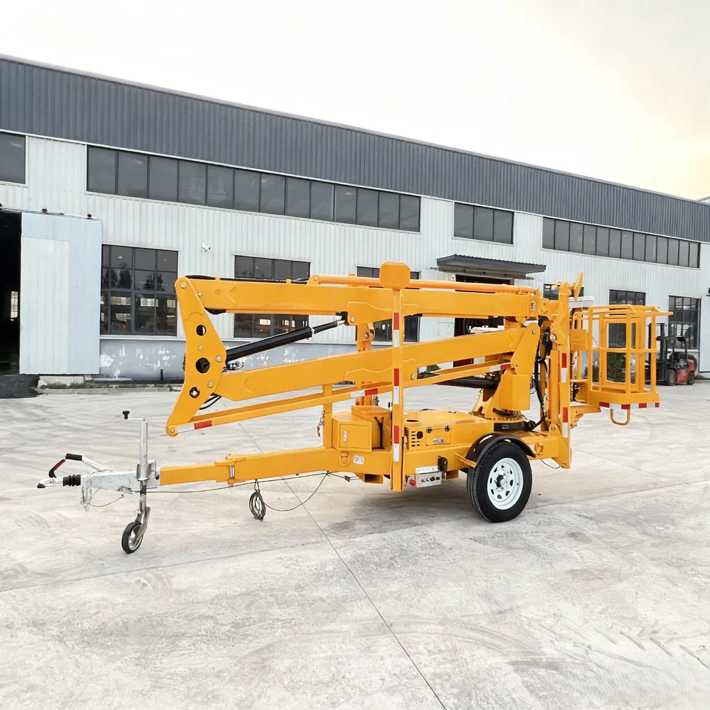 Towable Aerial Work Platform 10m 12m Height Boom Lift for Factory and Warehouse Operations Cherry Picker Mobile Boom Lift Man Lift