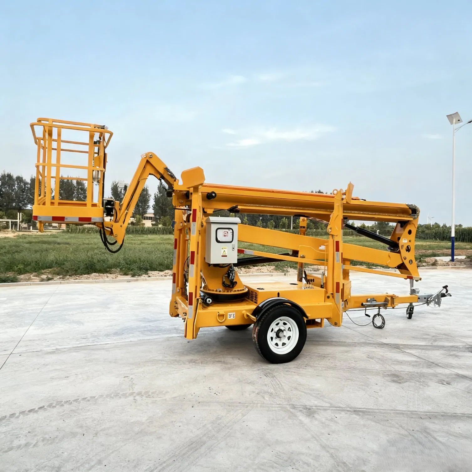 Towable Aerial Work Platform 10m 12m Height Boom Lift for Factory and Warehouse Operations Cherry Picker Mobile Boom Lift Man Lift