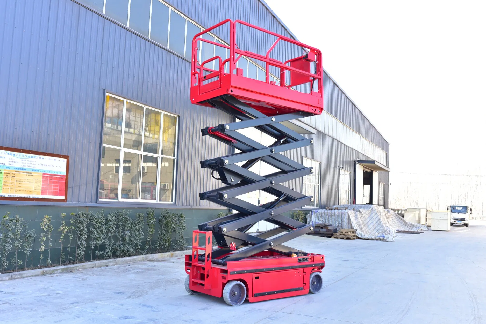 Haokun Rough Terrain Man 450kg 320kg Electric Hydraulic Battery Self Propelled Scissor Lift