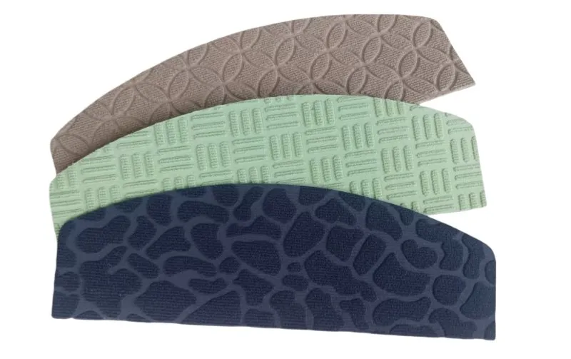 Self-adhesive floor mat