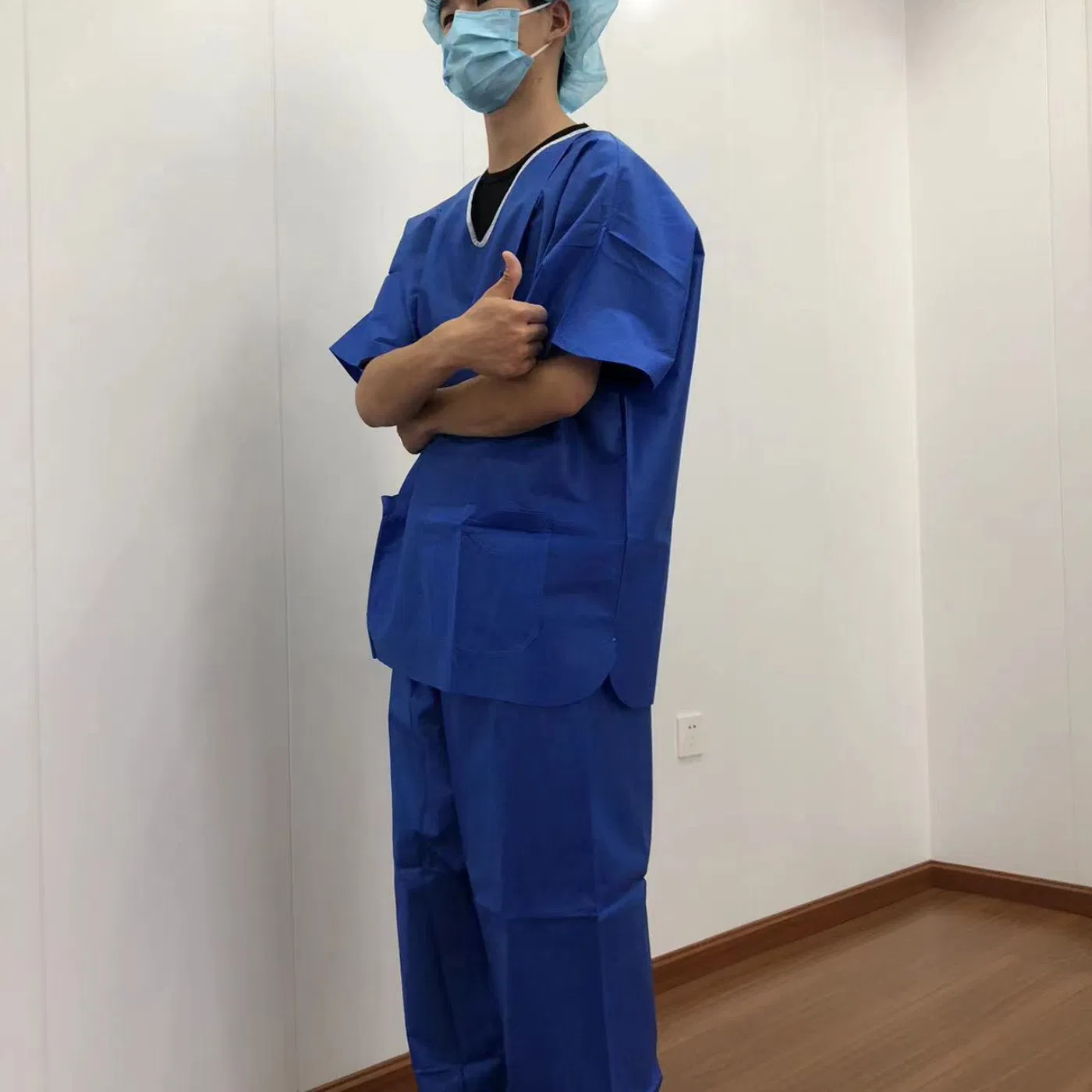 Disposable Nonwoven Fabric V-Neck Blue Scrub Suit Medical Supply Waterproof Scrub Suit Protective Clothes for Hospital Use