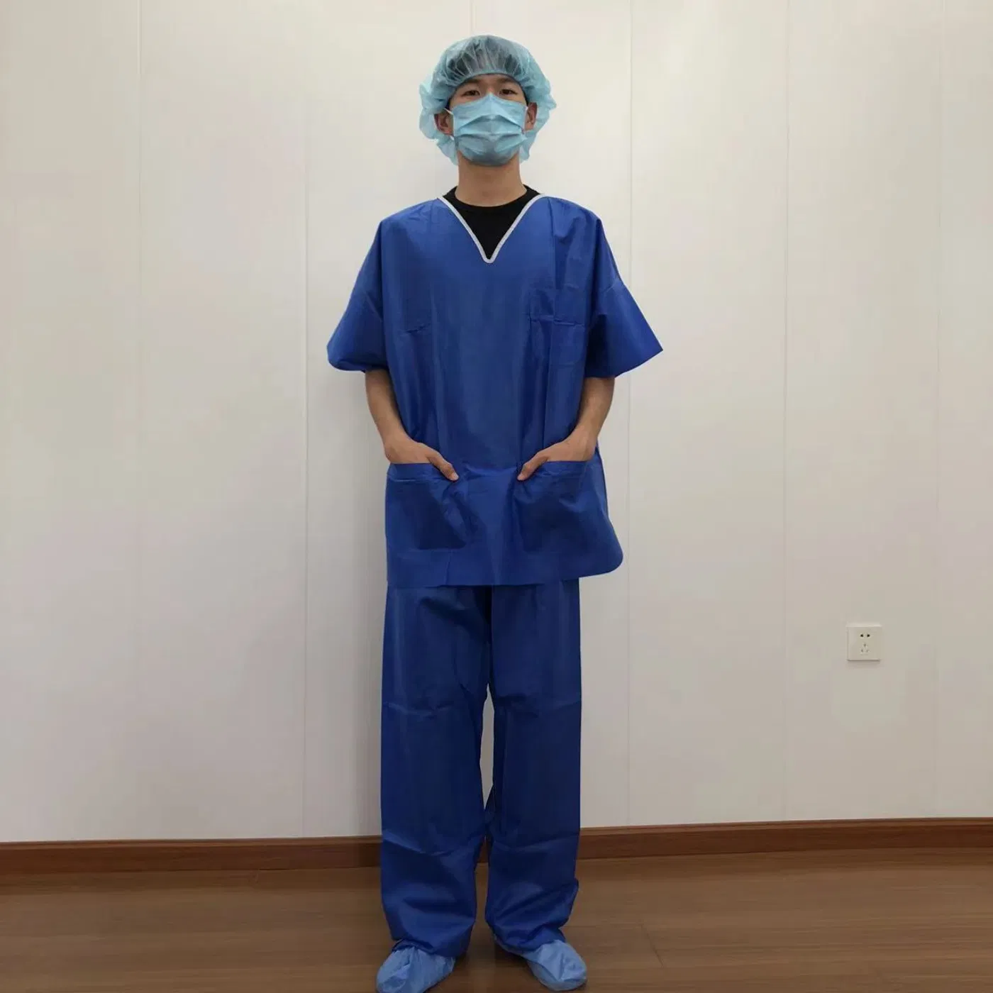 Disposable Nonwoven Fabric V-Neck Blue Scrub Suit Medical Supply Waterproof Scrub Suit Protective Clothes for Hospital Use
