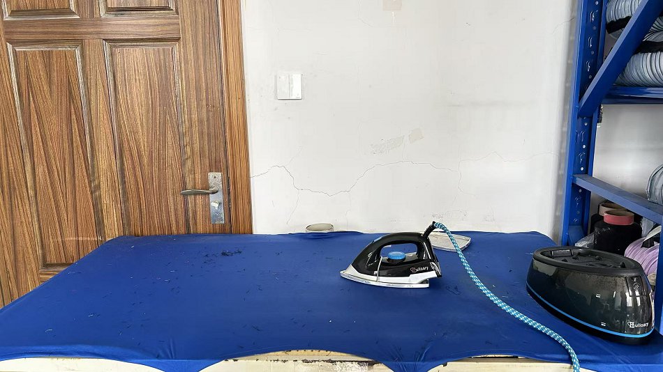 Professional ironing and finishing of fashion accessories for export