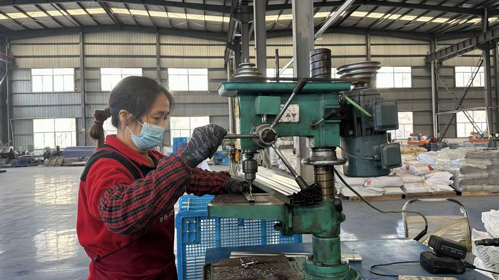 Tapping process creating threaded holes in metal parts for assembly