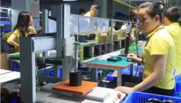 Precision gluing process in Vactrim LED lighting production