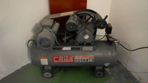 Industrial air compressor supporting manufacturing processes at Vactrim