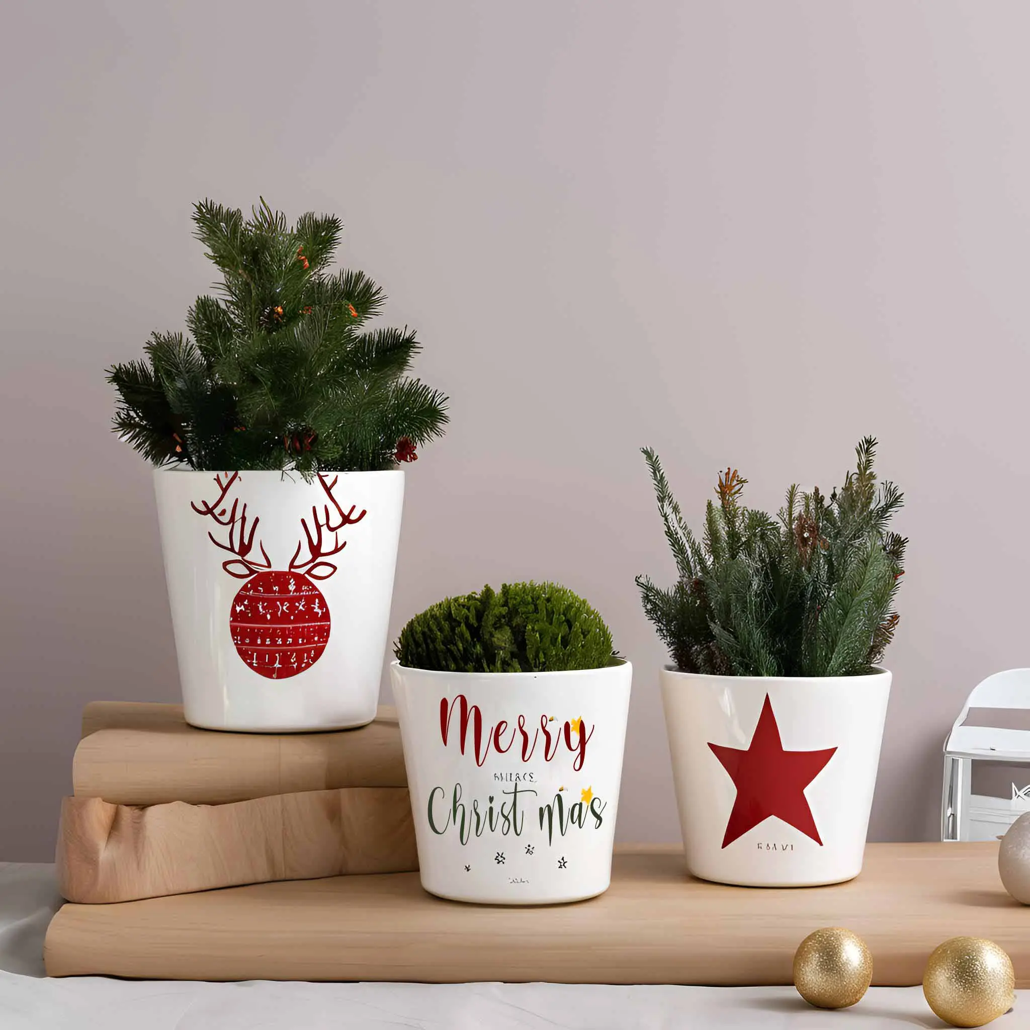 Festive green and gold glazed Christmas themed ceramic planters and tree motifs.