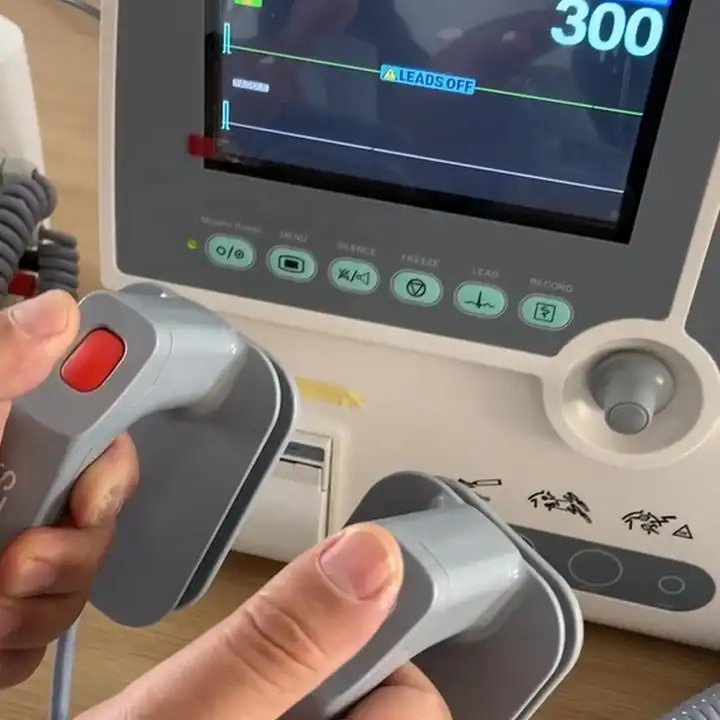 Professional First-Aid Manual External Portable Medical Defibrillator Monitor Machine for Human