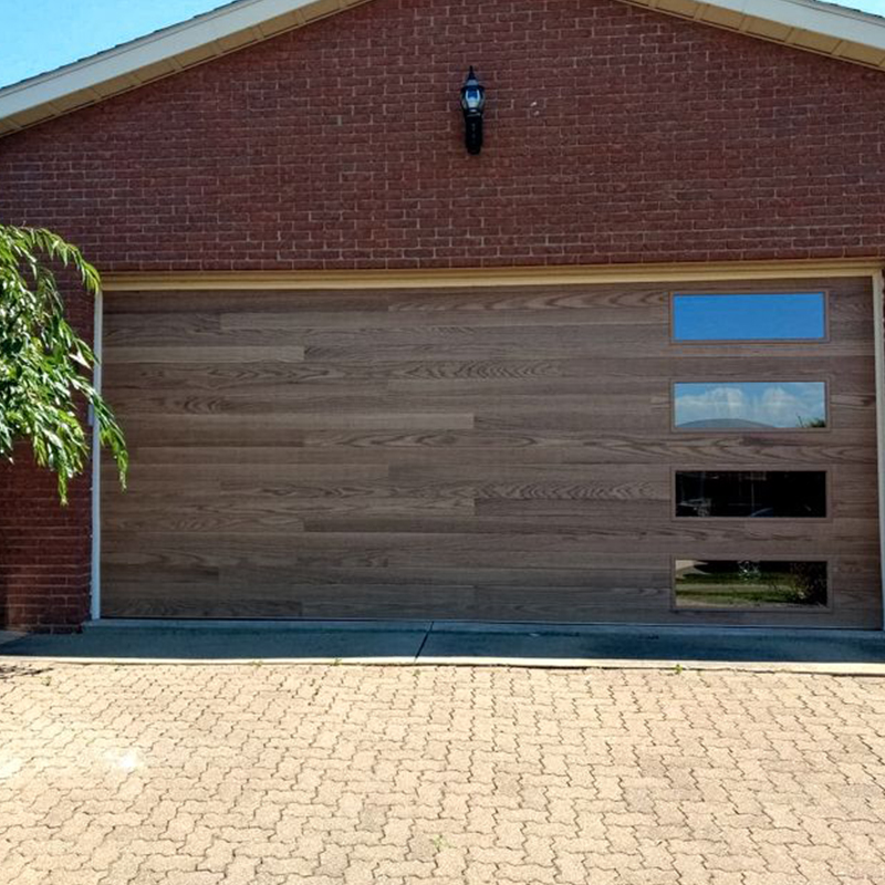 OUNA High Performance Garage Door Combines Insulated Aluminum Panels Hurricane Resistance and Automatic Smart Home Features