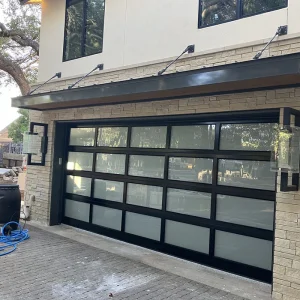 OUNA Insulated Sandwich Panel Sectional Garage Door with Aluminum Alloy for Thermal and Noise Control in Factories